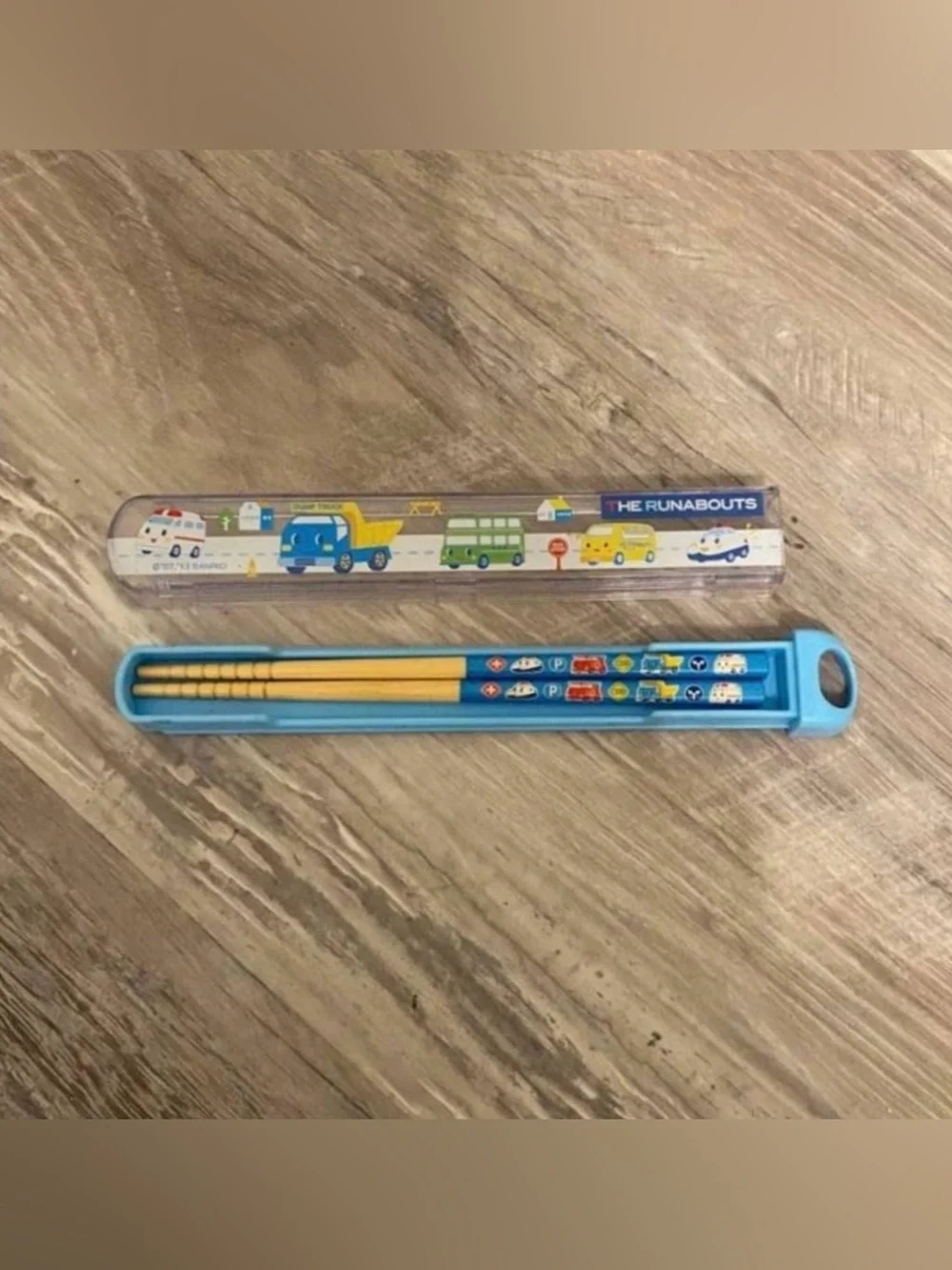 “The Runabouts” blue chopstick set. Includes children’s chopsticks and